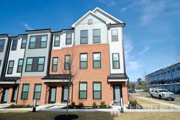 a front view of multi story residential apartment building