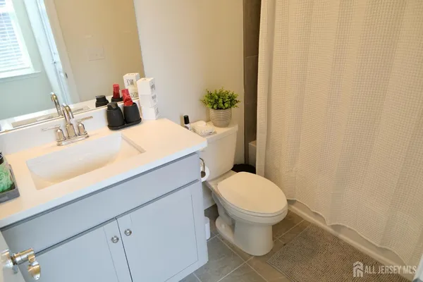 a bedroom with a workspace