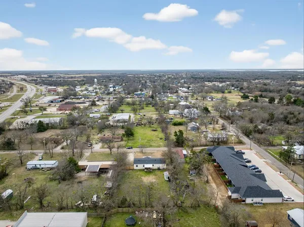 an aerial view of residential building with parking space