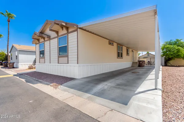 a view of a house with a street