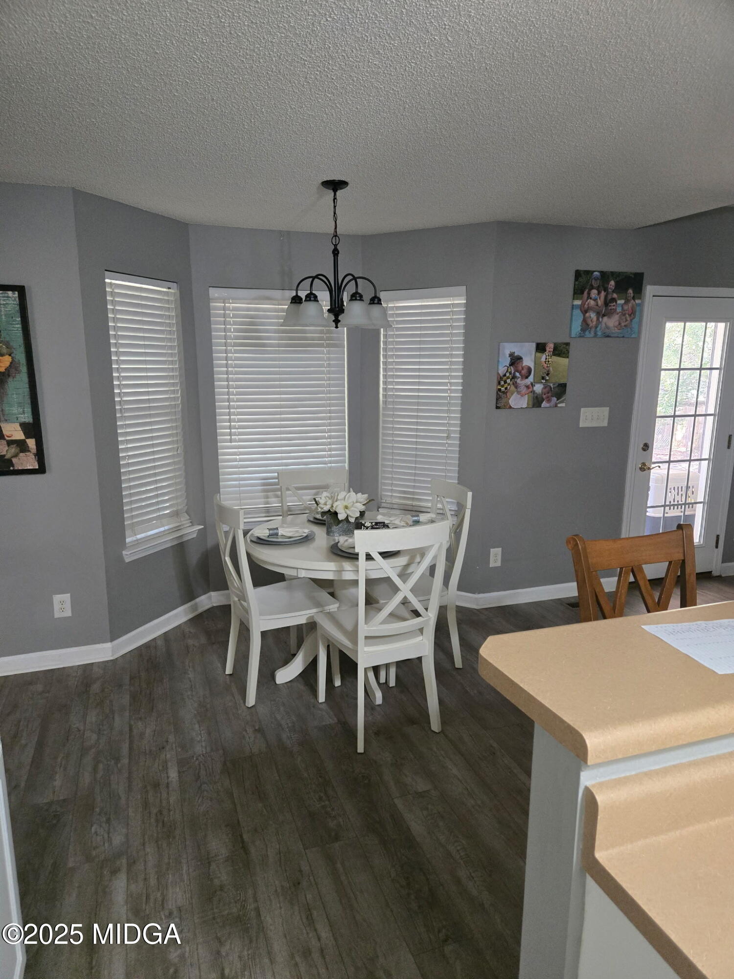 254 Crestview Lane Gray, GA 31032 - Photo 11 of 15 a view of a dining room with furniture and window