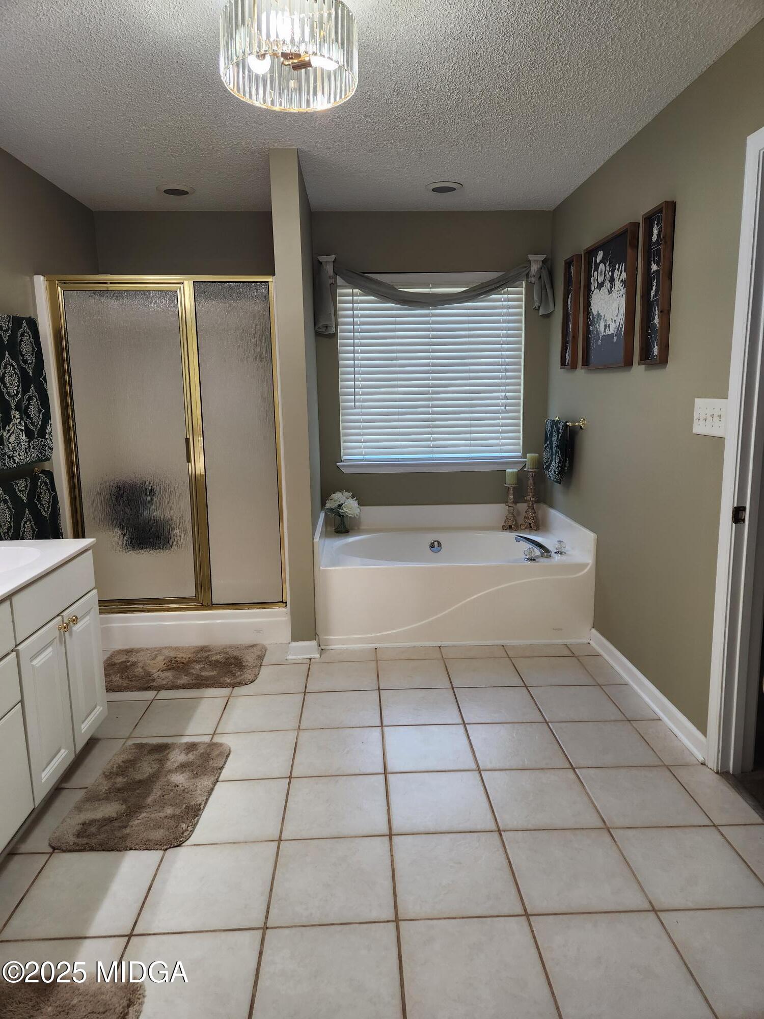 254 Crestview Lane Gray, GA 31032 - Photo 7 of 15 a bathroom with a sink a toilet and a mirror