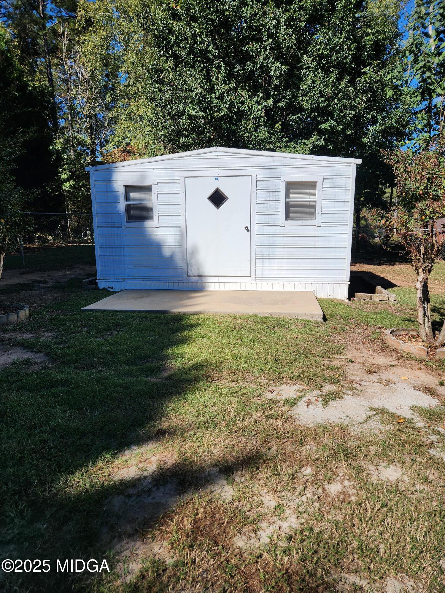 254 Crestview Lane Gray, GA 31032 - Photo 9 of 15 a view of a backyard