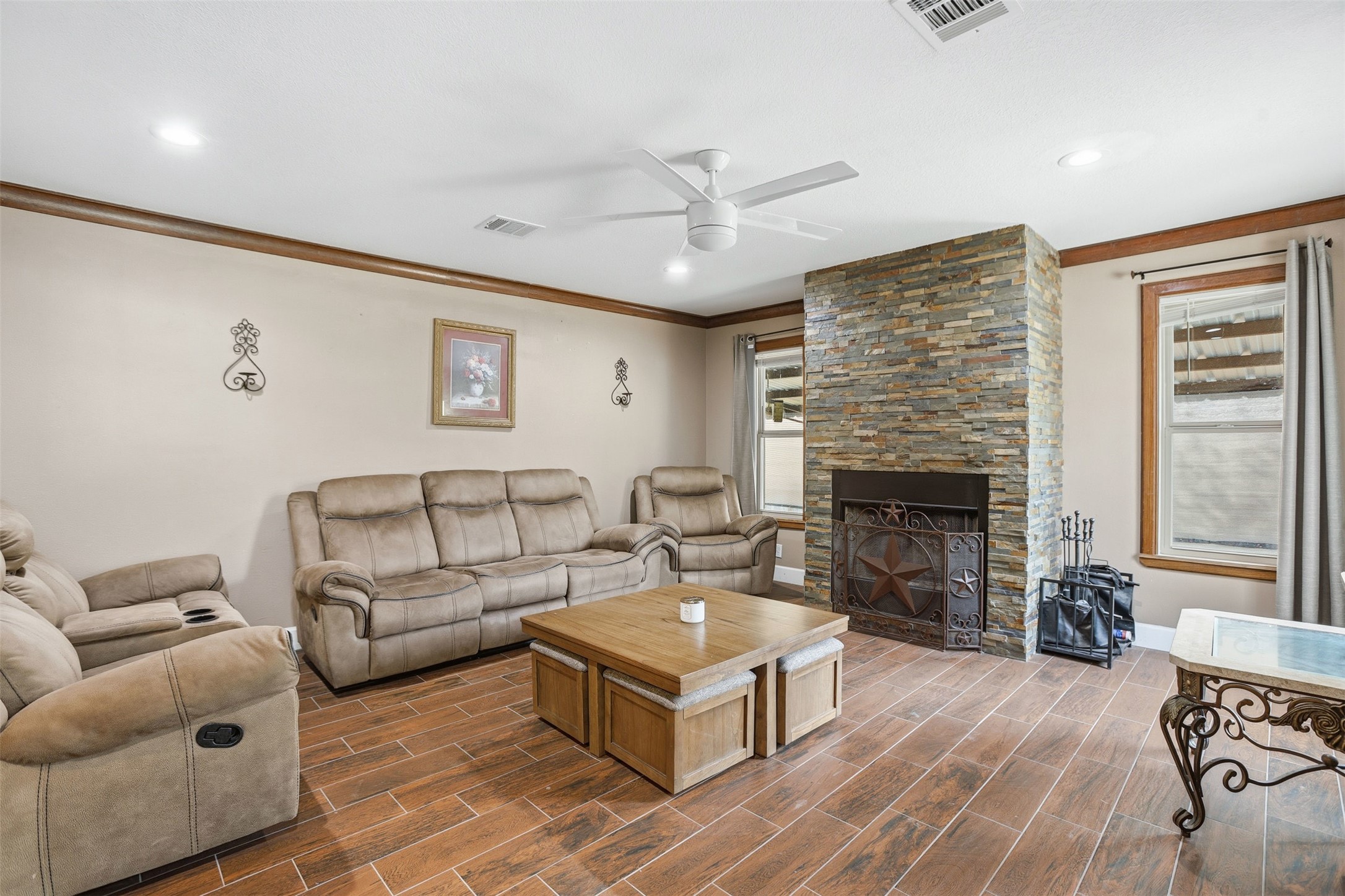 25436 Northampton New Caney, TX 77357 - Photo 1 of 26 a living room with furniture and a fireplace