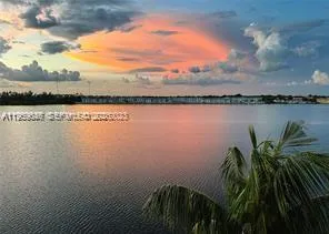 a view of a lake from a yard