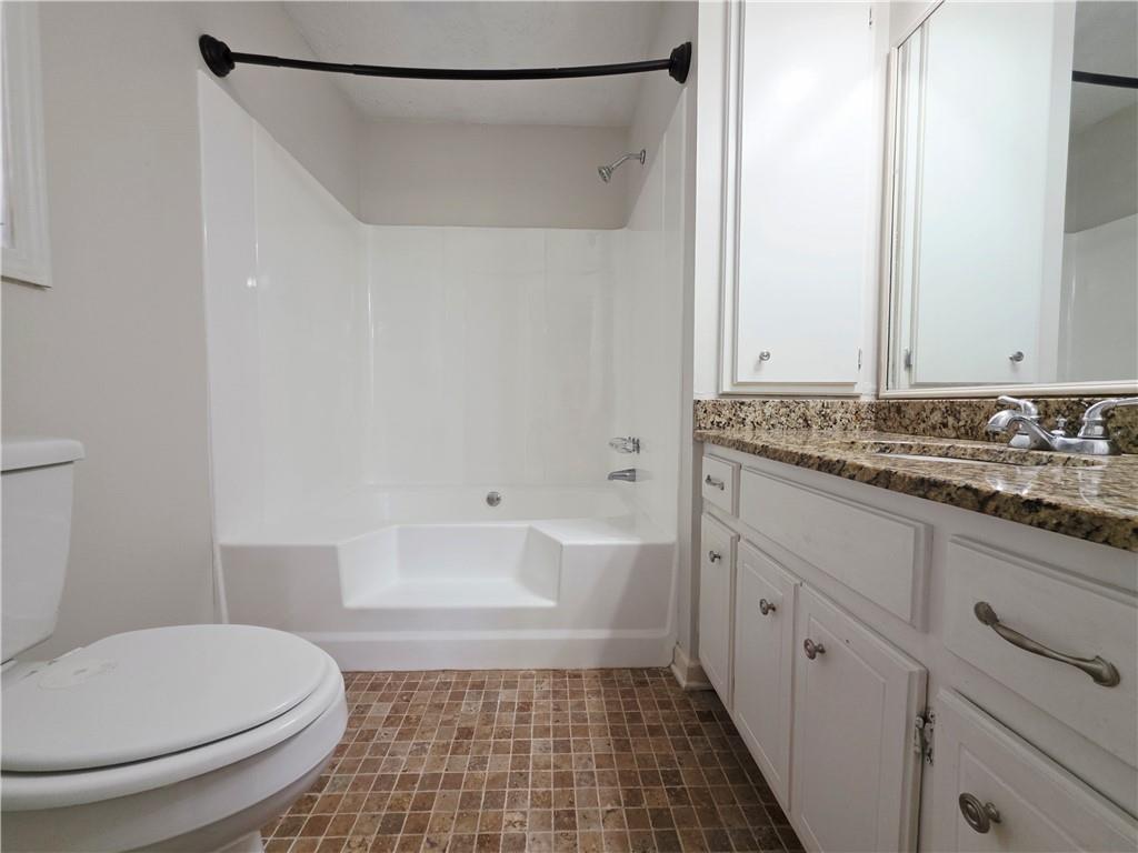 570 Remington Lane Acworth, GA 30101 - Photo 12 of 20 a bathroom with a sink and a mirror