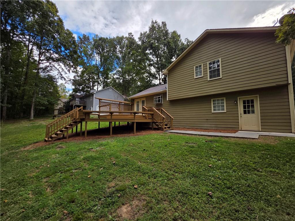 570 Remington Lane Acworth, GA 30101 - Photo 14 of 20 a view of a house with a backyard