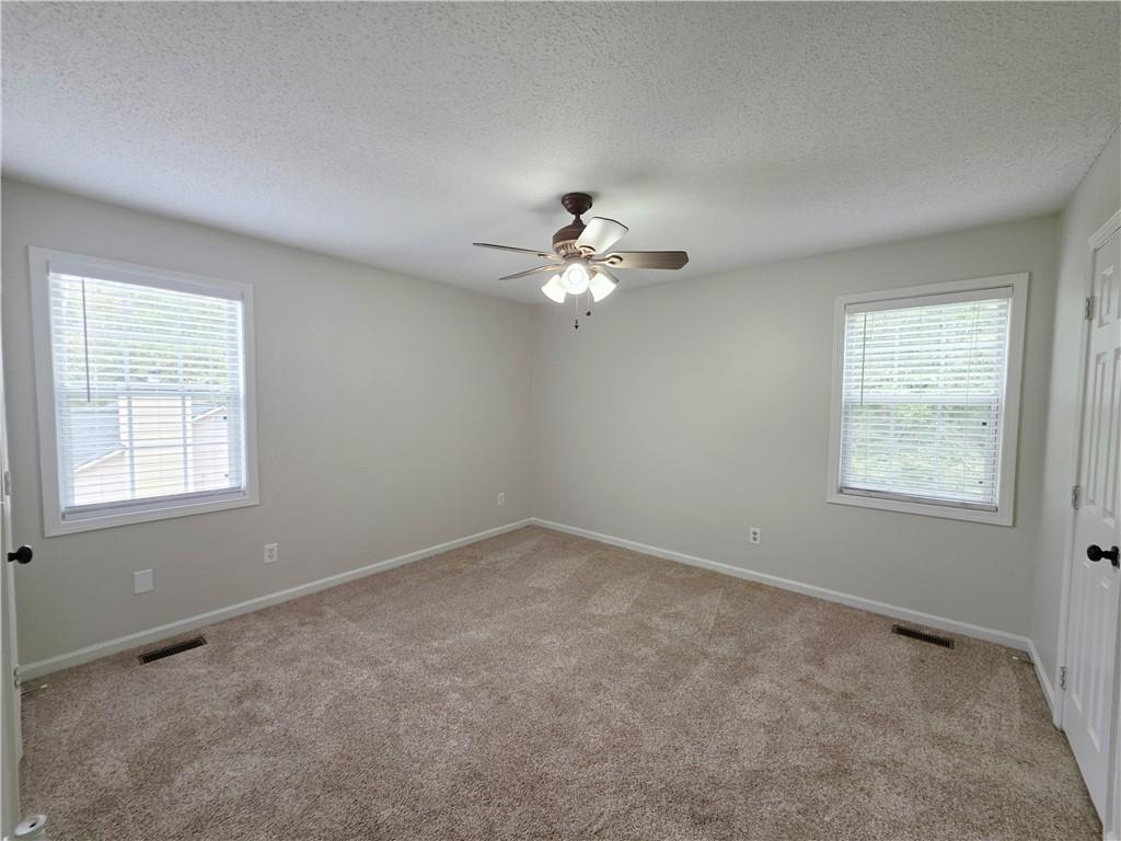 570 Remington Lane Acworth, GA 30101 - Photo 10 of 20 an empty room with a window