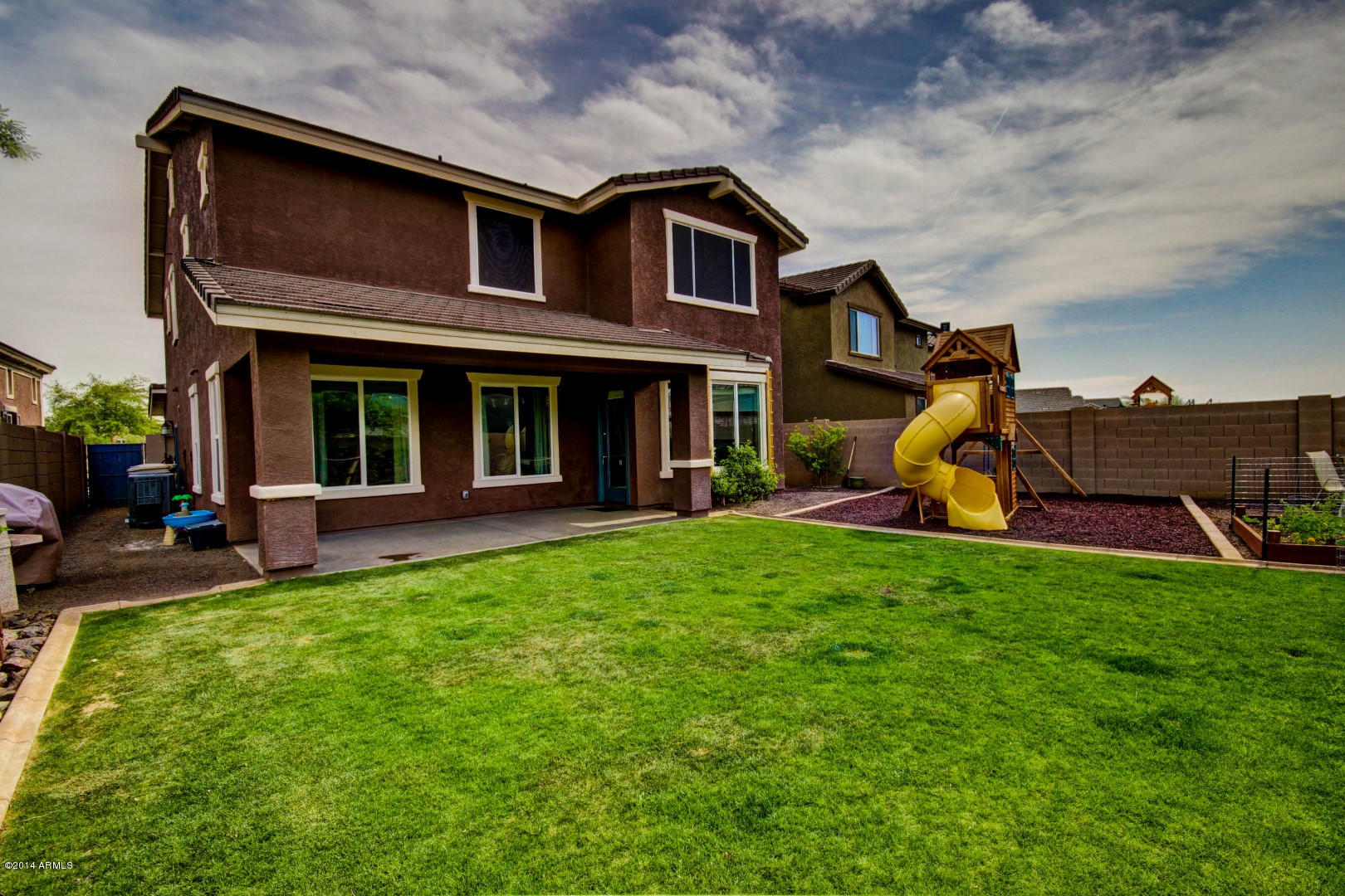 2280 North Alsap Road Buckeye, AZ 85396 - Photo 63 of 65 a view of a house with a yard and furniture
