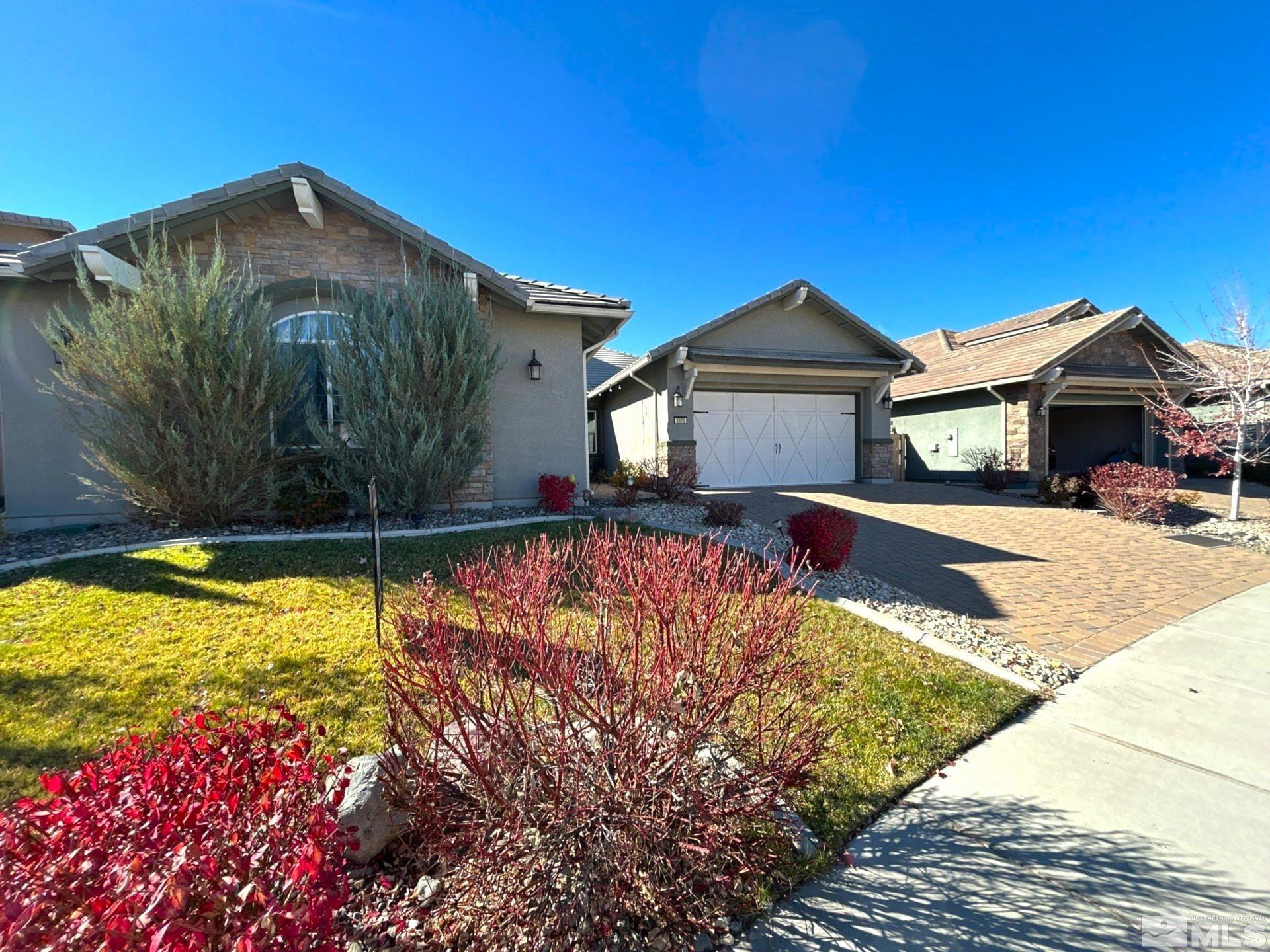 2070 Blue Boy Lane Reno, NV 89521 - Photo 2 of 31 a view of a house with a yard