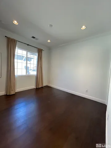 a bathroom with a sink vanity and toilet