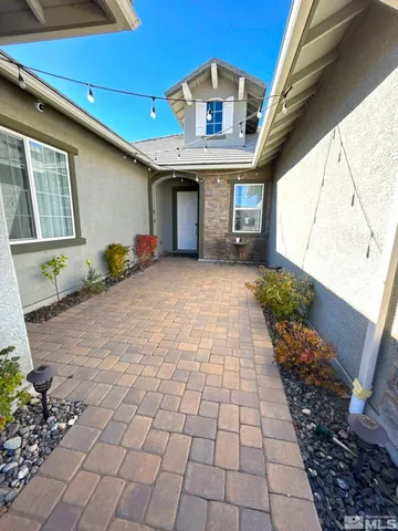 a view of a house with a patio