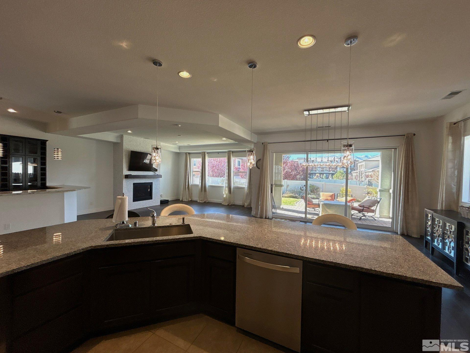 2070 Blue Boy Lane Reno, NV 89521 - Photo 10 of 31 a kitchen with a sink stove and cabinets