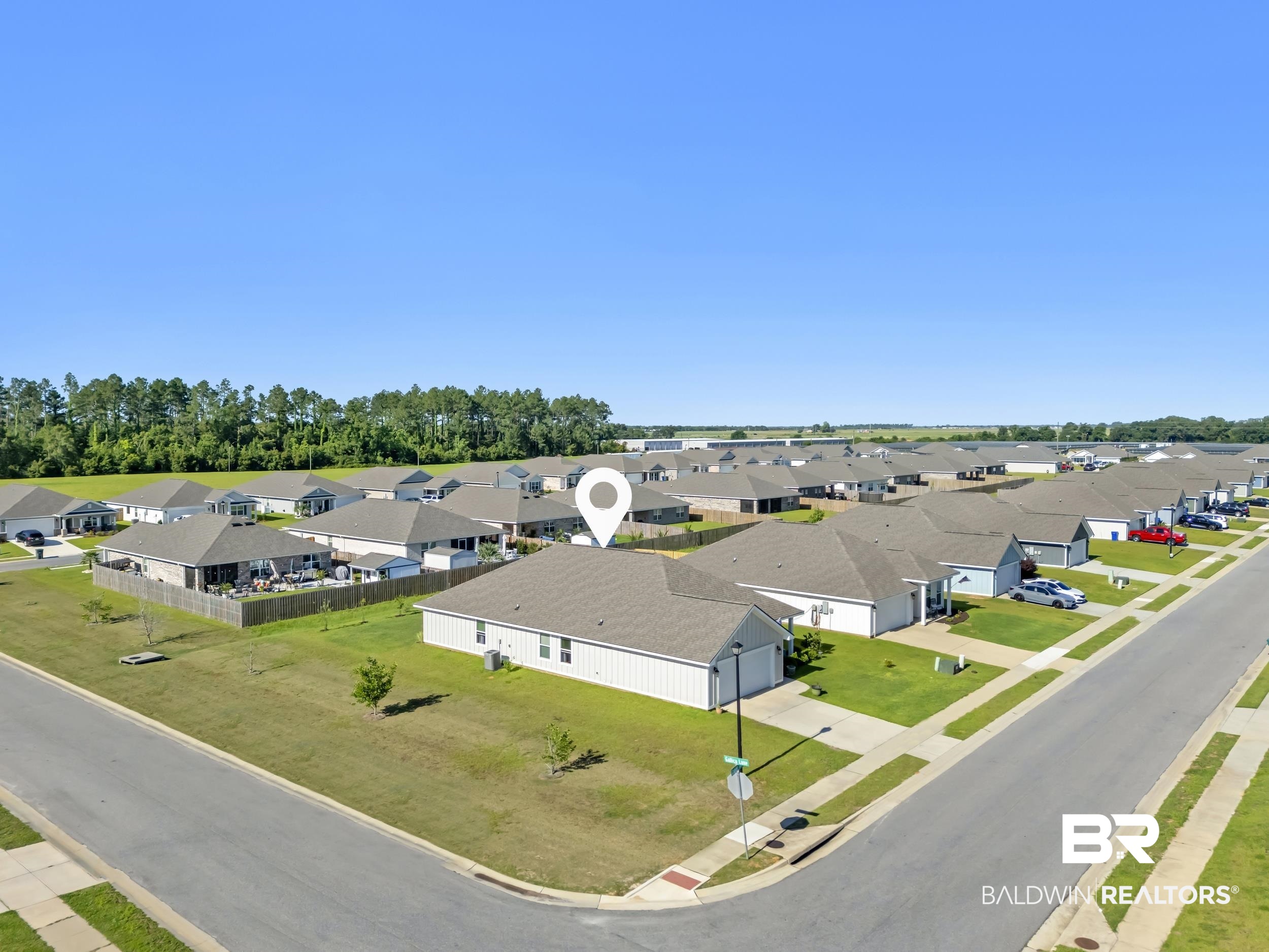 1228 Caper Avenue Foley, AL 36535 - Photo 41 of 54 Aerial view of a residential community featuring single-story homes with shingle roofs