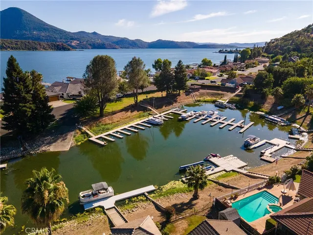 an aerial view of houses with outdoor space