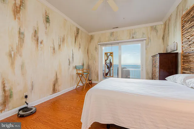 a bedroom with a bed and a table