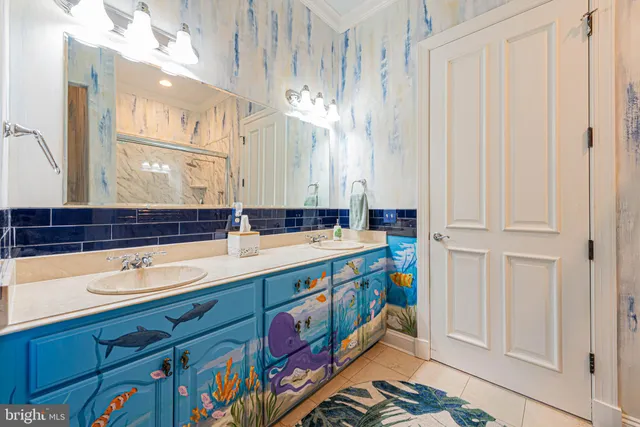 a bathroom with a sink a mirror and a bathtub