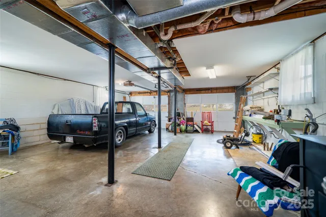 a gym room with furniture and a window