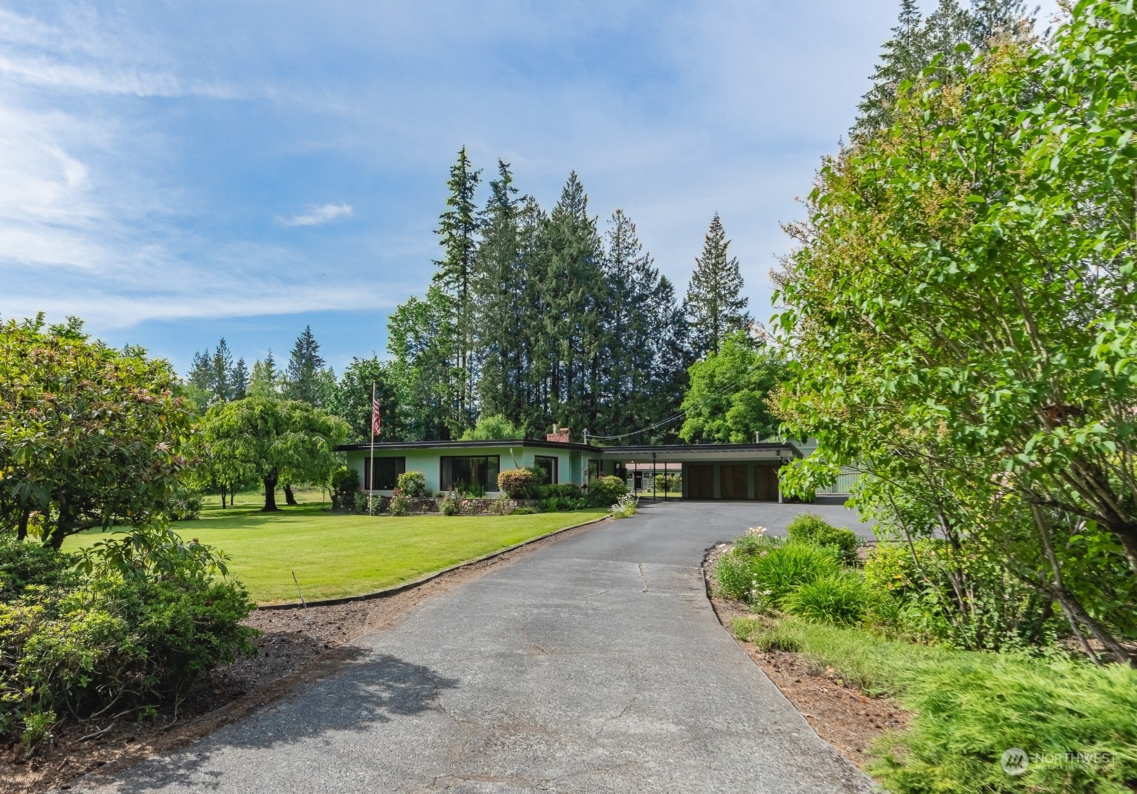 3326 Cedarville Road Bellingham, WA 98226 - Photo 1 of 40 a view of a garden with trees