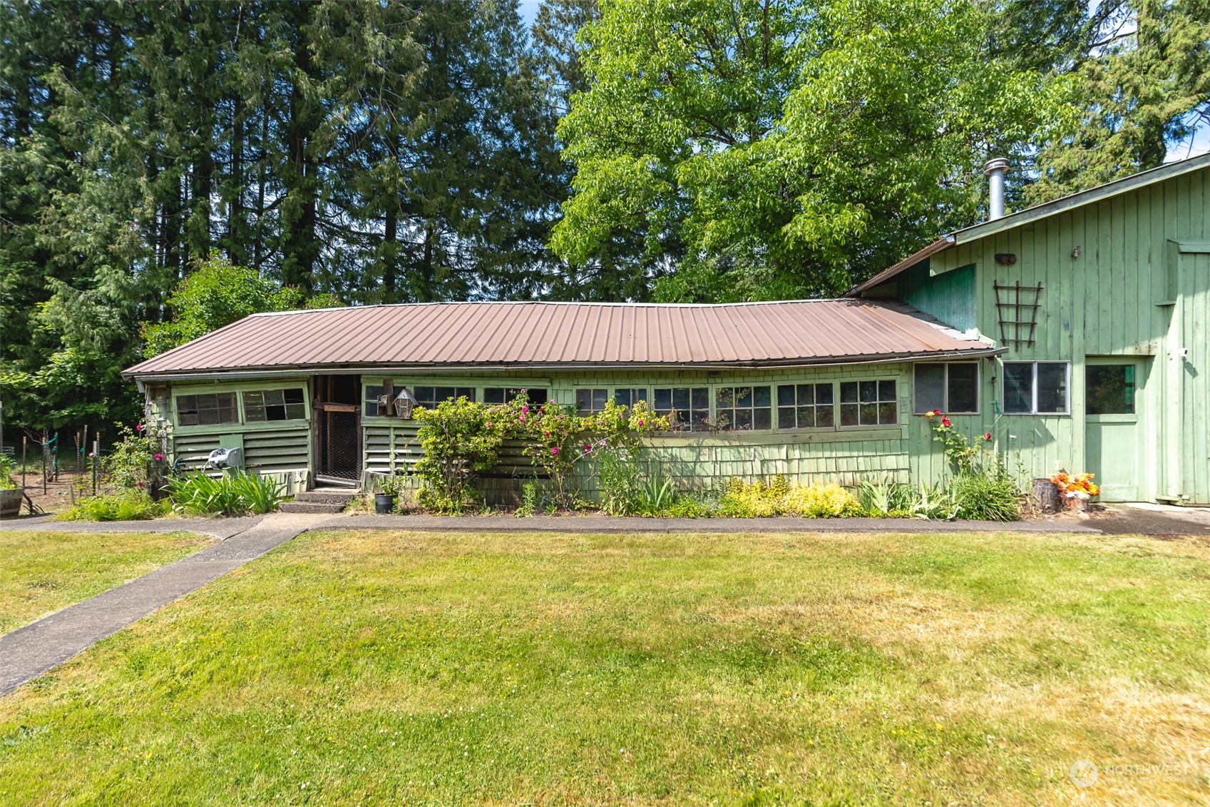3326 Cedarville Road Bellingham, WA 98226 - Photo 20 of 40 a front view of a house with swimming pool having outdoor seating