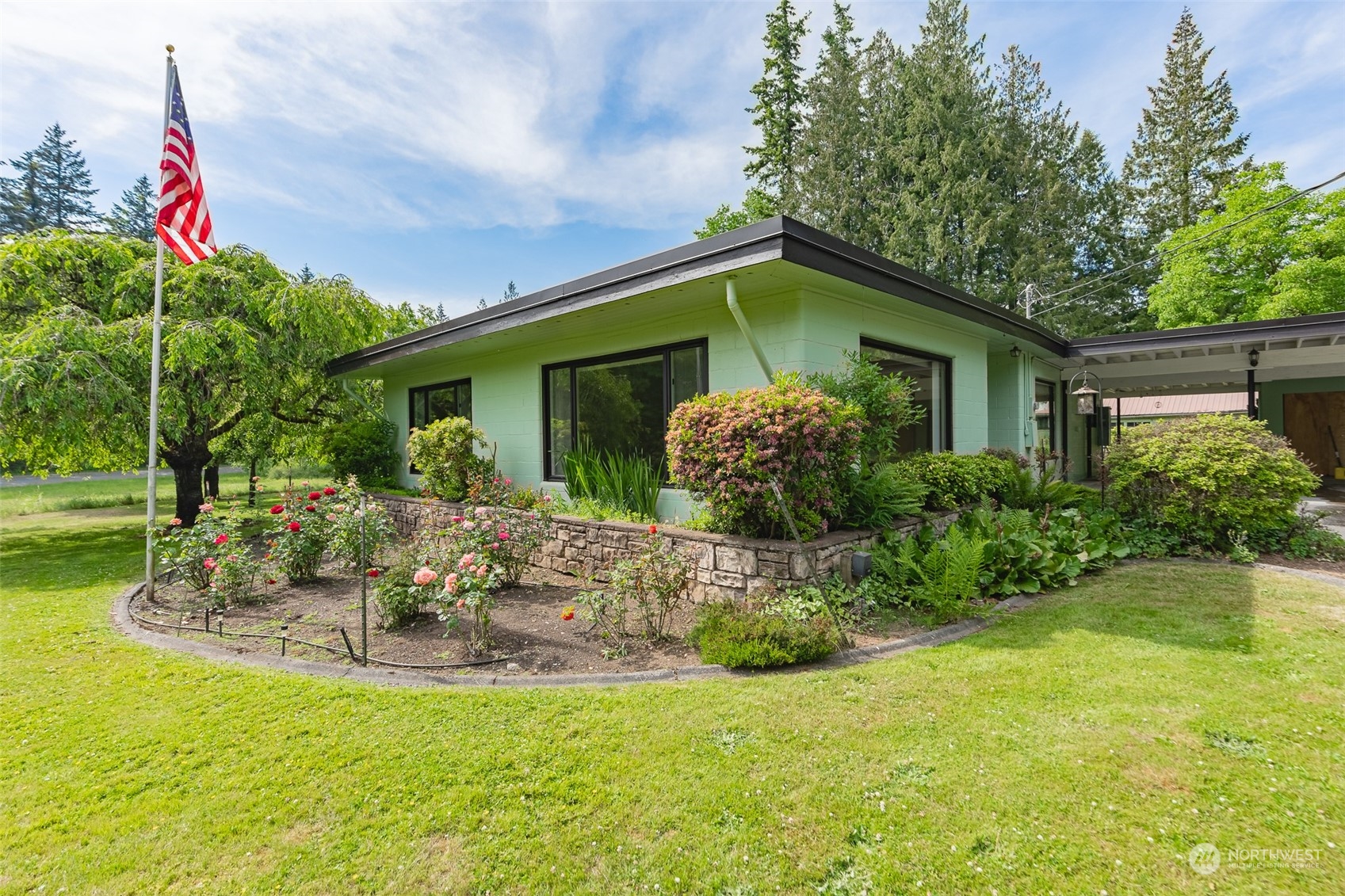3326 Cedarville Road Bellingham, WA 98226 - Photo 2 of 40 a view of a house with pool and garden
