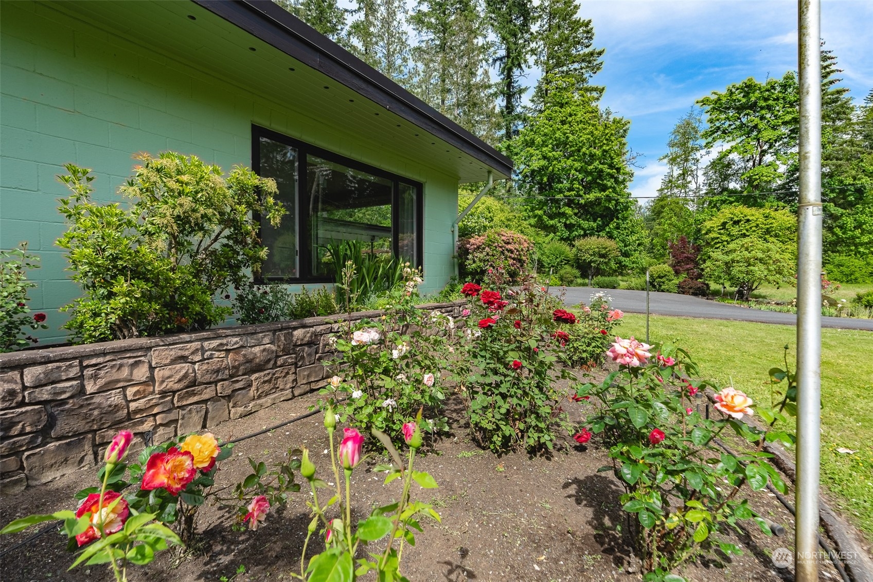 3326 Cedarville Road Bellingham, WA 98226 - Photo 28 of 40 a flower garden is sitting in front of flowers