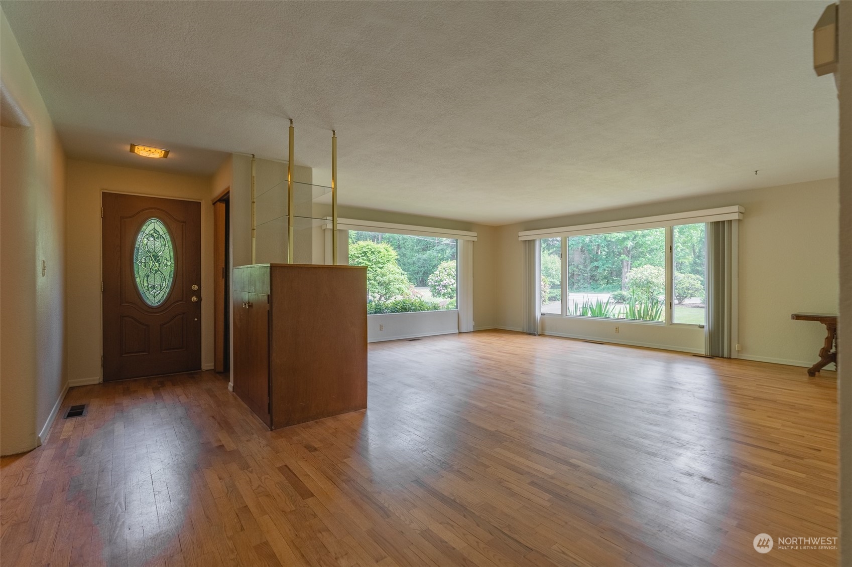 3326 Cedarville Road Bellingham, WA 98226 - Photo 5 of 40 an empty room with wooden floor and windows