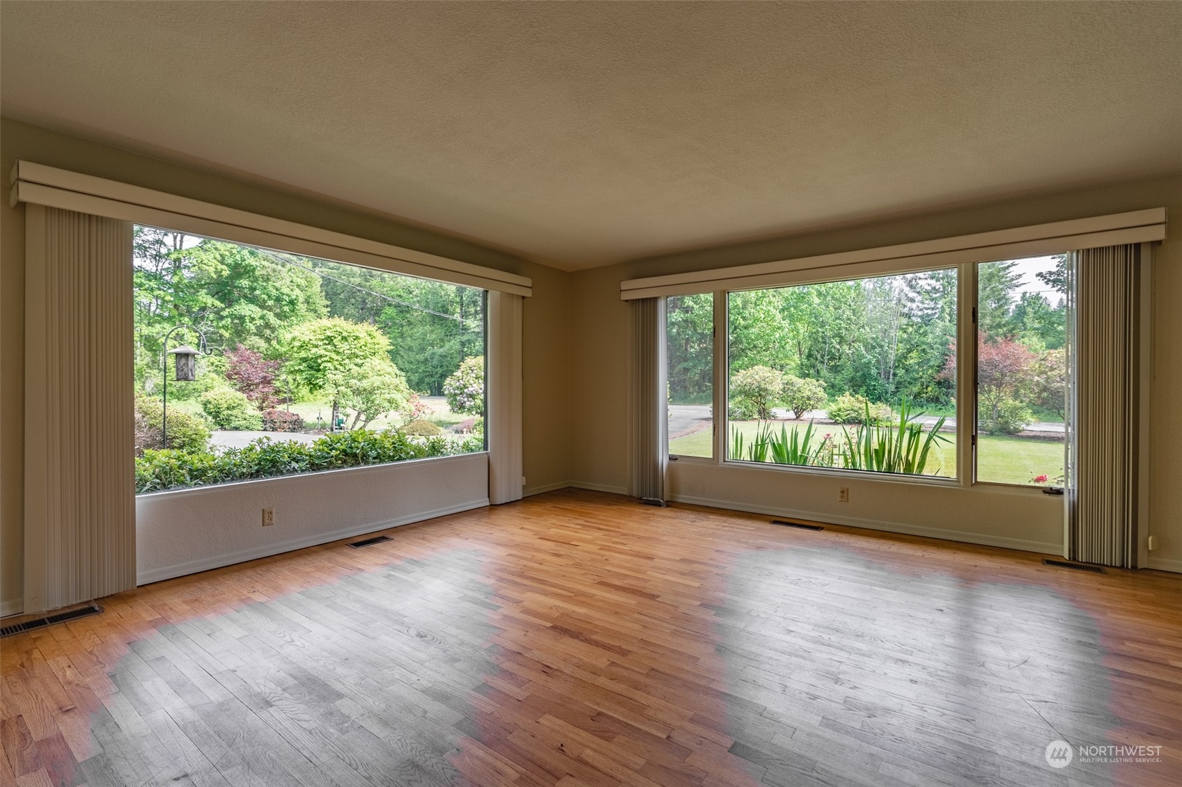 3326 Cedarville Road Bellingham, WA 98226 - Photo 6 of 40 a view of empty room with wooden floor and fan