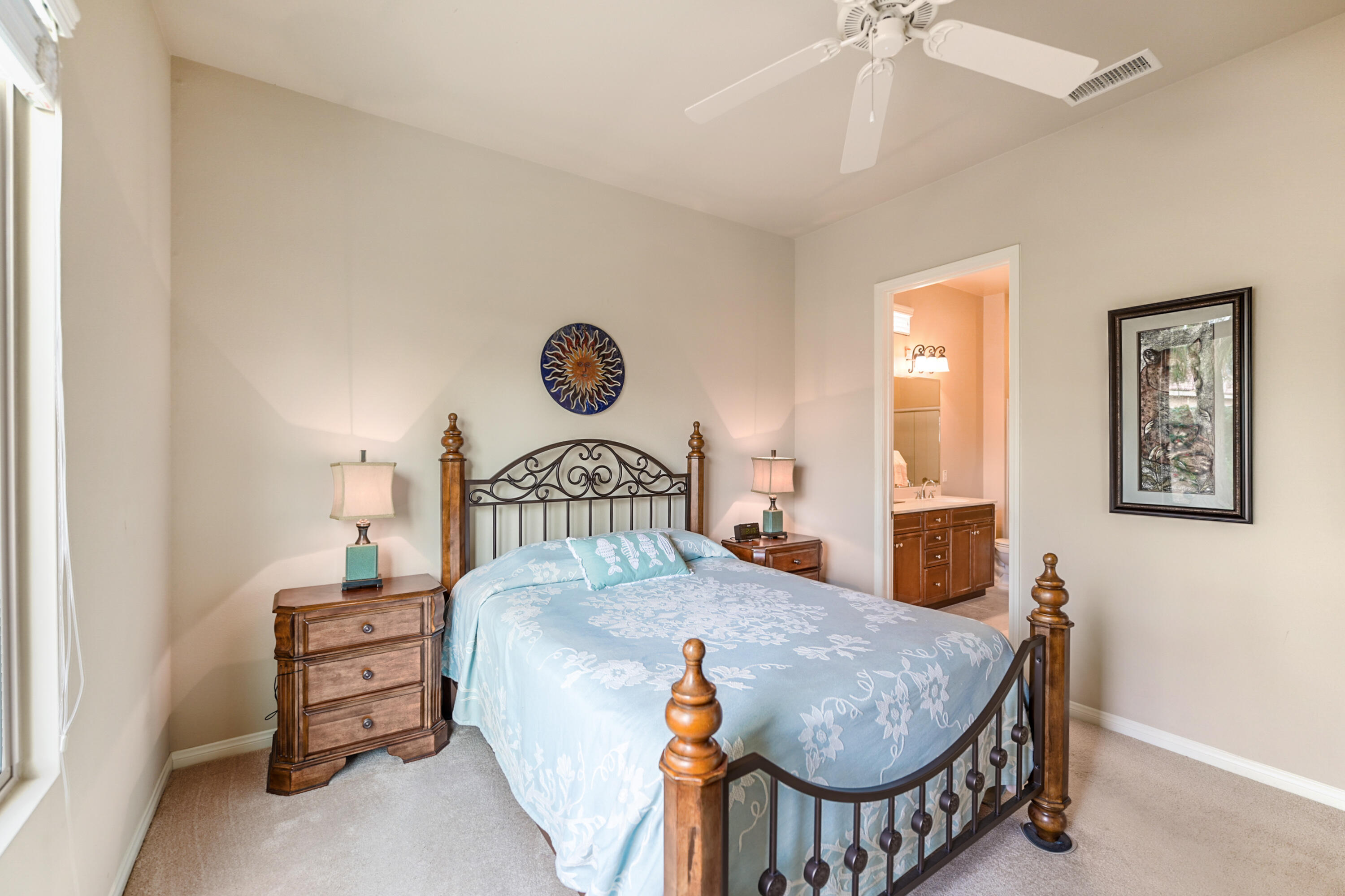 81674 Avenida Celaya Indio, CA 92203 - Photo 15 of 43 a bedroom with a bed window and a table