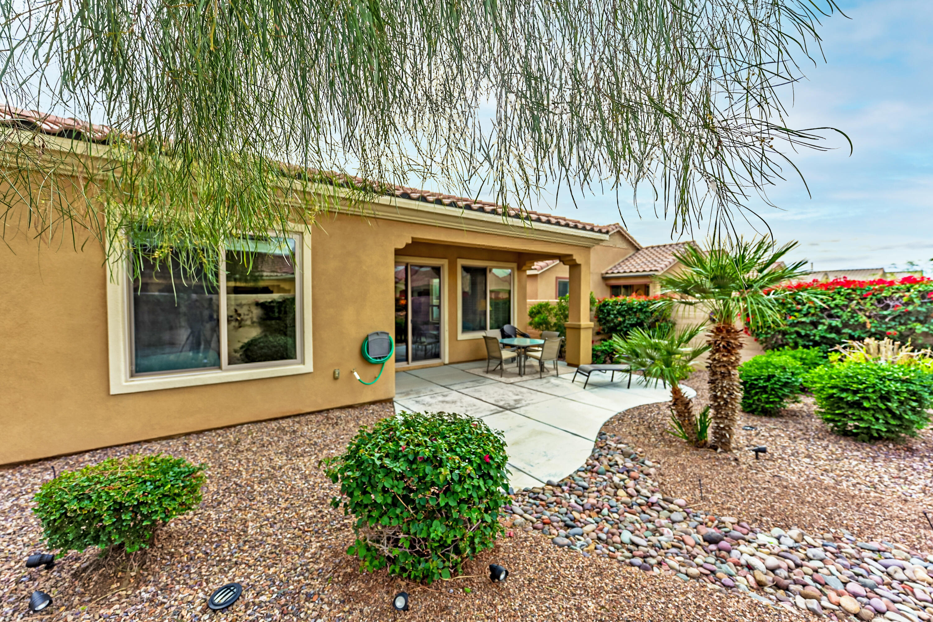 81674 Avenida Celaya Indio, CA 92203 - Photo 24 of 43 a front view of a house with garden