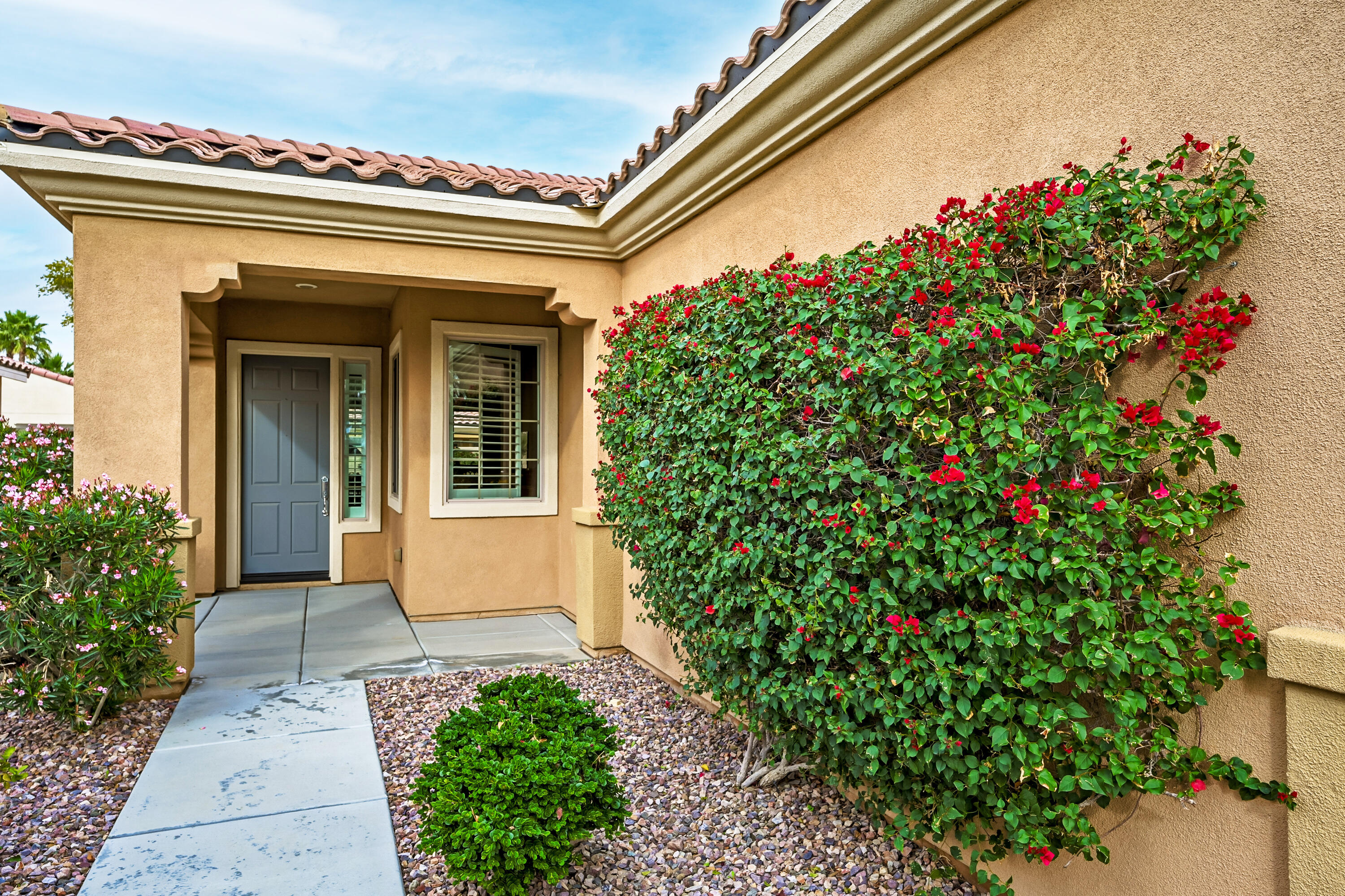 81674 Avenida Celaya Indio, CA 92203 - Photo 3 of 43 a flower plants in front of a house