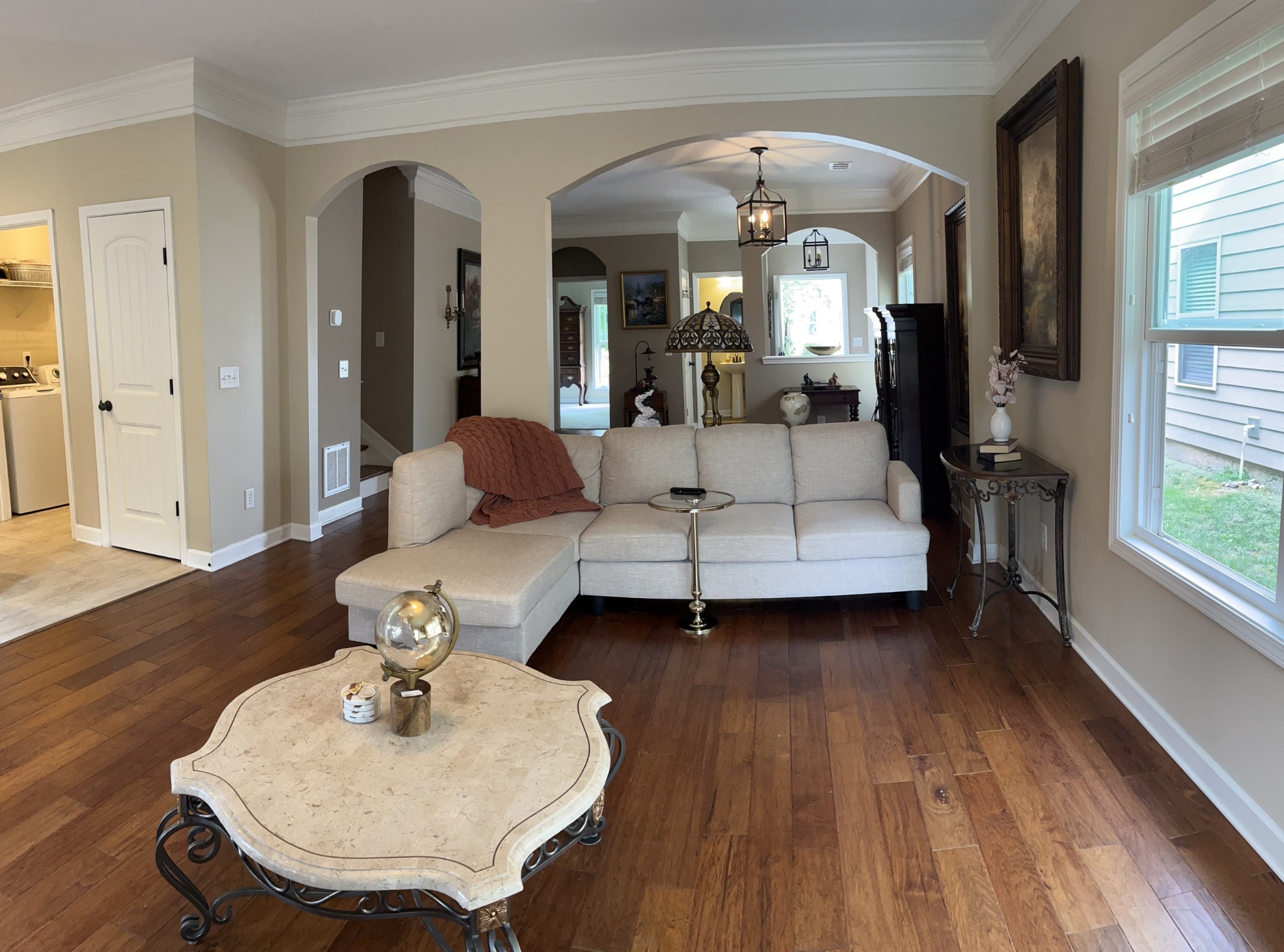 2819 Sterlingshire Drive Murfreesboro, TN 37128 - Photo 13 of 35 a living room with furniture and a chandelier