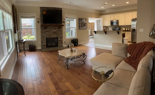 a living room with furniture or fireplace and a fireplace