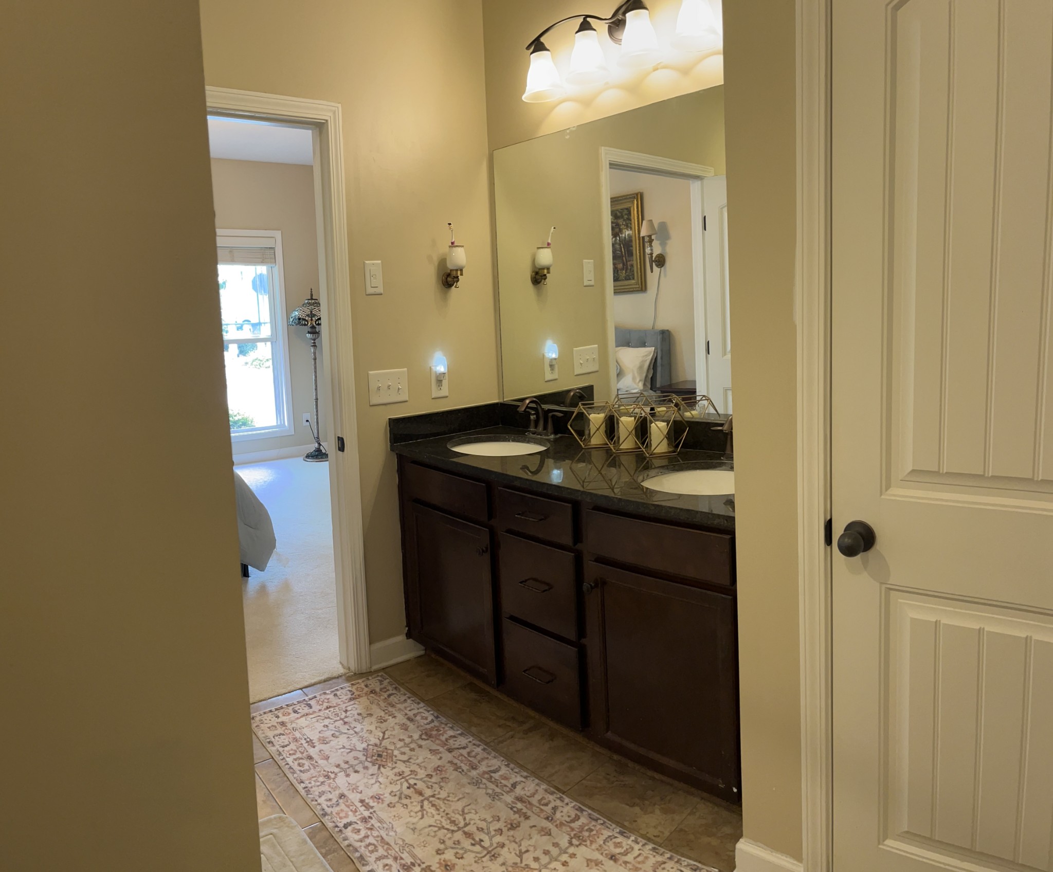 2819 Sterlingshire Drive Murfreesboro, TN 37128 - Photo 21 of 35 a bathroom with a sink and a mirror