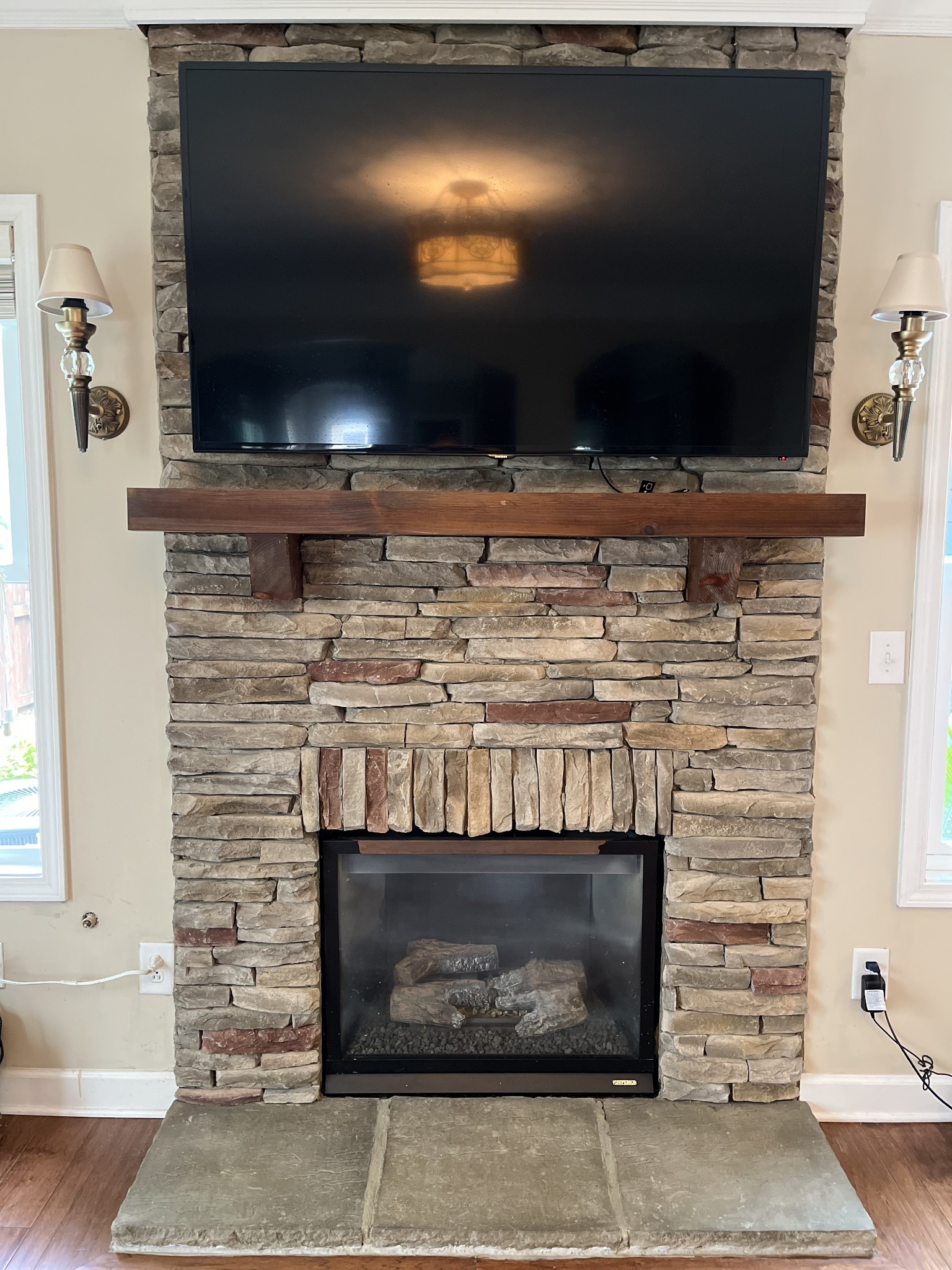 2819 Sterlingshire Drive Murfreesboro, TN 37128 - Photo 9 of 35 a fireplace with a flat screen tv