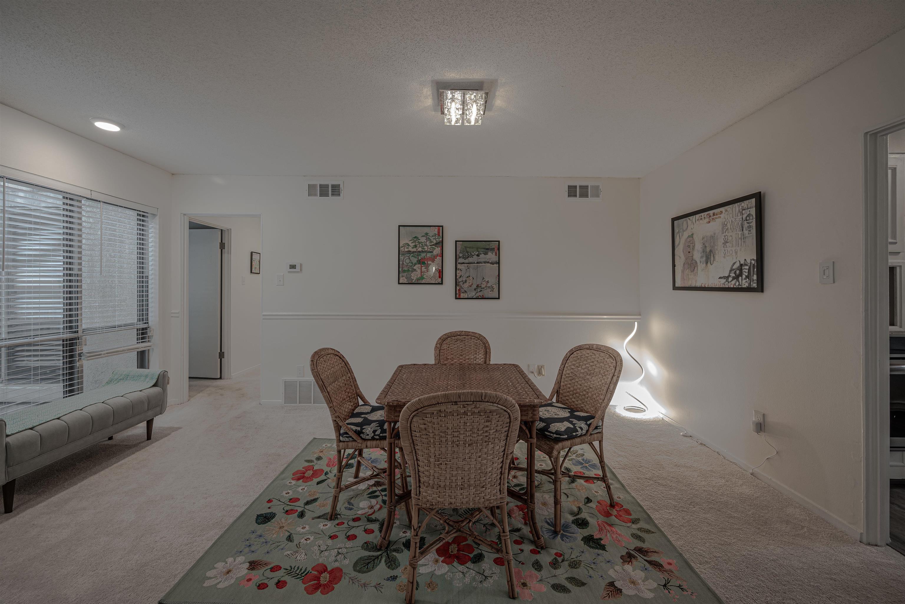 427 South Perkins Road, Unit 4272 Memphis, TN 38117 - Photo 8 of 29 a view of a dining room with furniture and a window