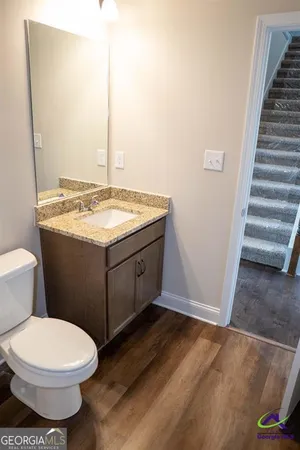 a bathroom with a sink and a toilet