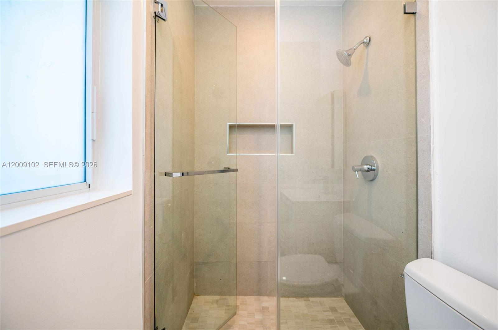 330 Southwest 27th Road Miami, FL 33129 - Photo 20 of 62 a bathroom with a shower and toilet