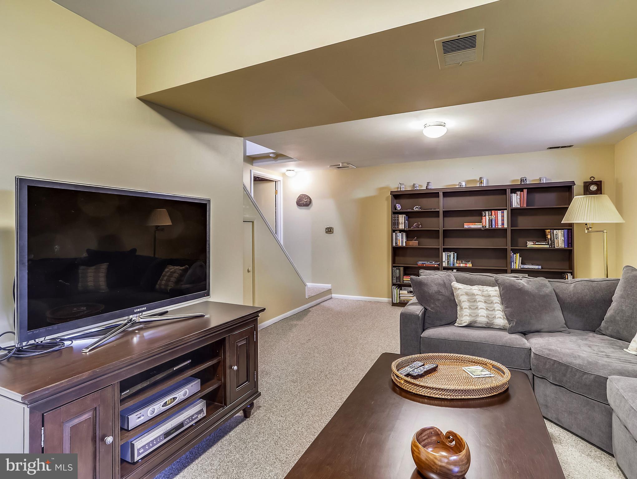 779 Stinchcomb Road Severna Park, MD 21146 - Photo 31 of 57 Lower Level Family Room. Bookshelves convey