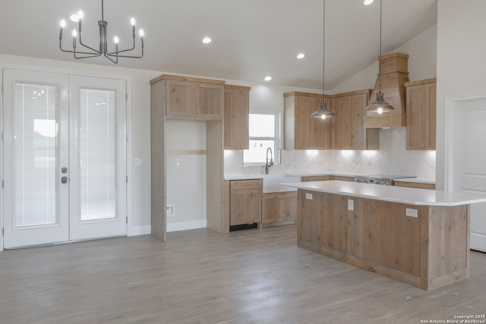 591 Eichman Road Poteet, TX 78065 - Photo 7 of 18 a large bathroom with a large mirror vanity and shower