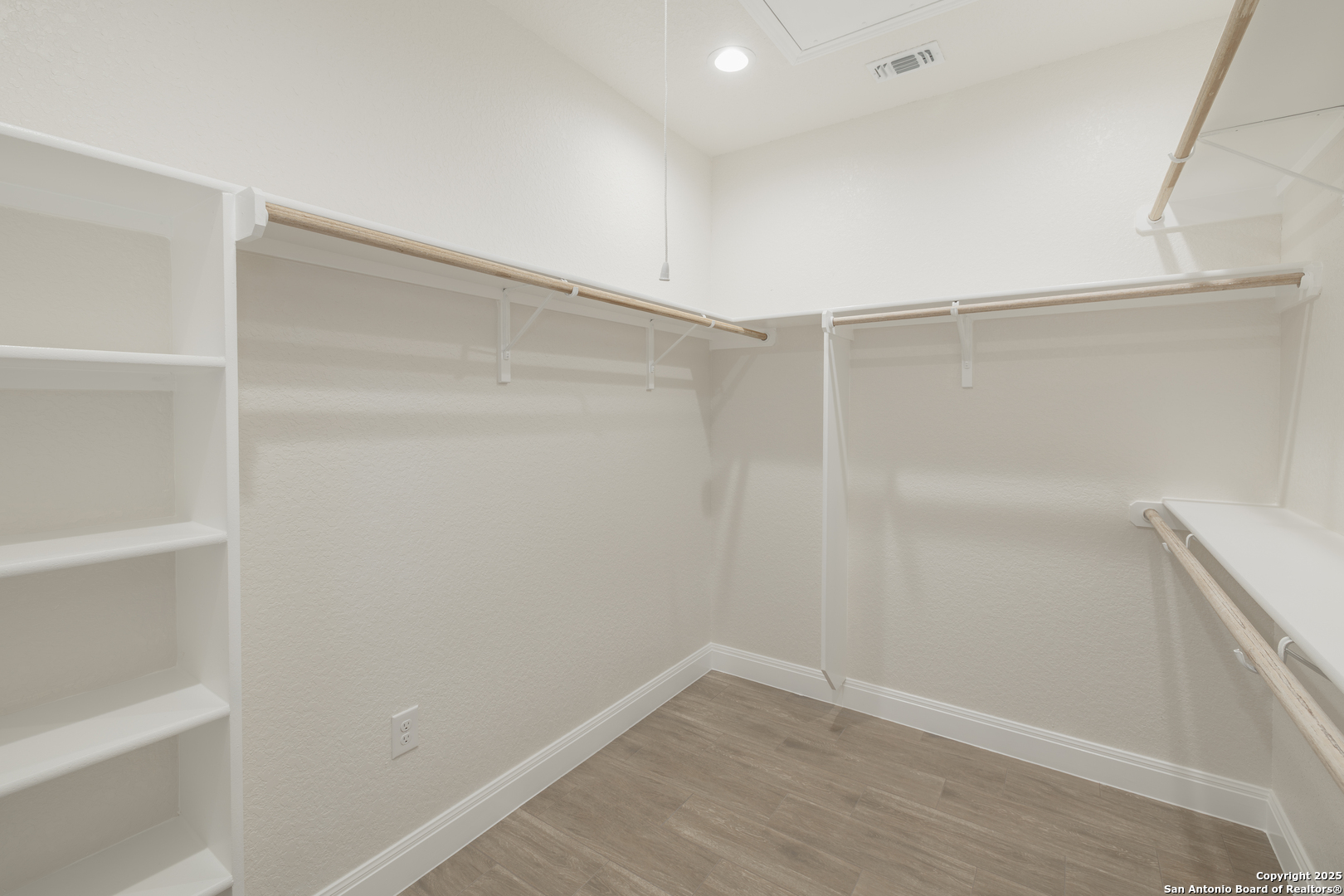 591 Eichman Road Poteet, TX 78065 - Photo 9 of 18 a view of an empty walk in closet