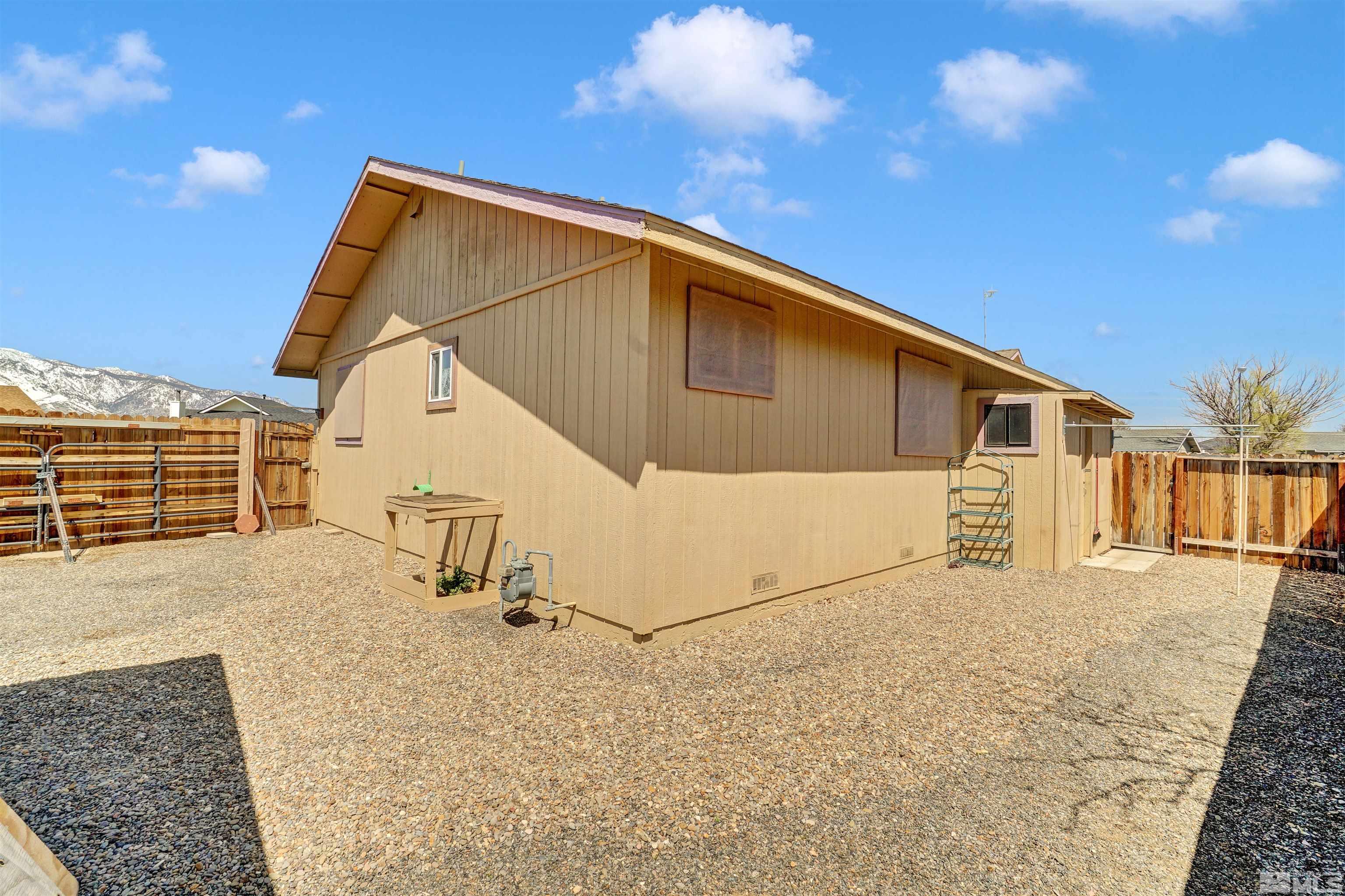 725 Addler Road Gardnerville, NV 89460 - Photo 21 of 24 a view of a house with backyard