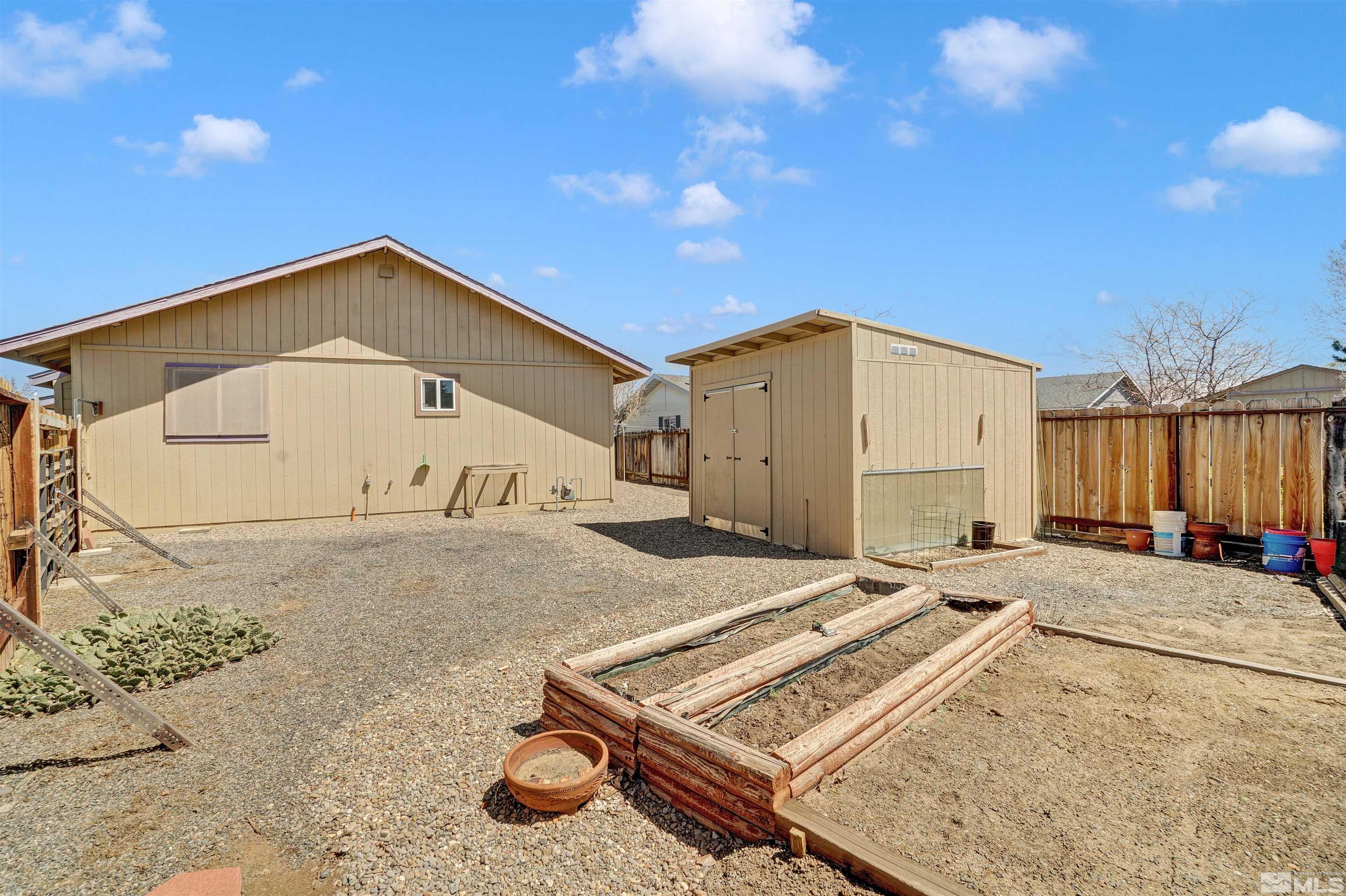 725 Addler Road Gardnerville, NV 89460 - Photo 24 of 24 a view of a house with backyard