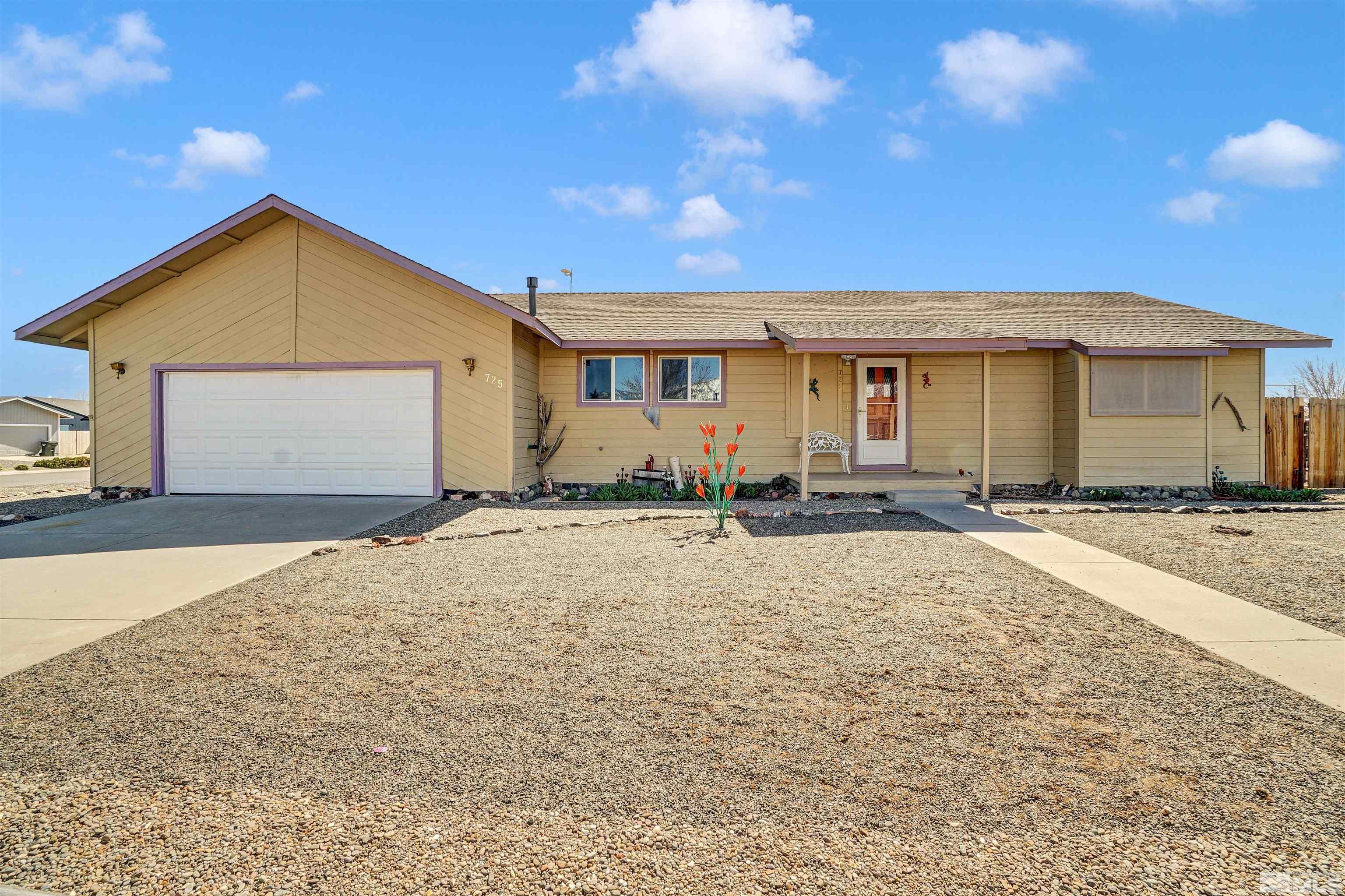 725 Addler Road Gardnerville, NV 89460 - Photo 4 of 24 a view of a house with a yard