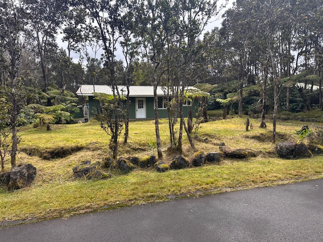 11-3791 4th Street Volcano, HI 96785 - Photo 4 of 16 a view of a yard with swimming pool