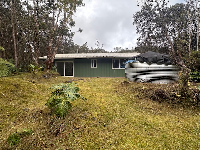 11-3791 4th Street Volcano, HI 96785 - Photo 5 of 16 a view of a house with a yard