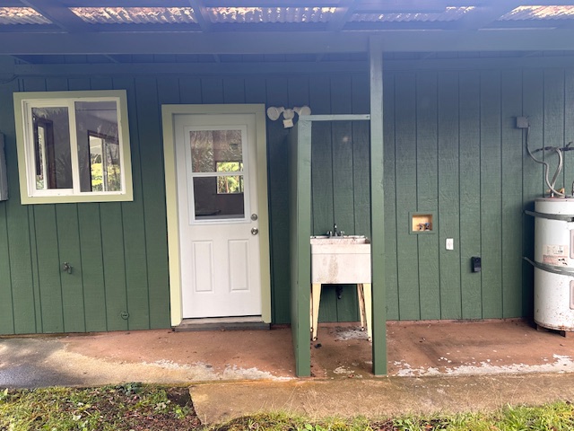 11-3791 4th Street Volcano, HI 96785 - Photo 6 of 16 a front view of a house