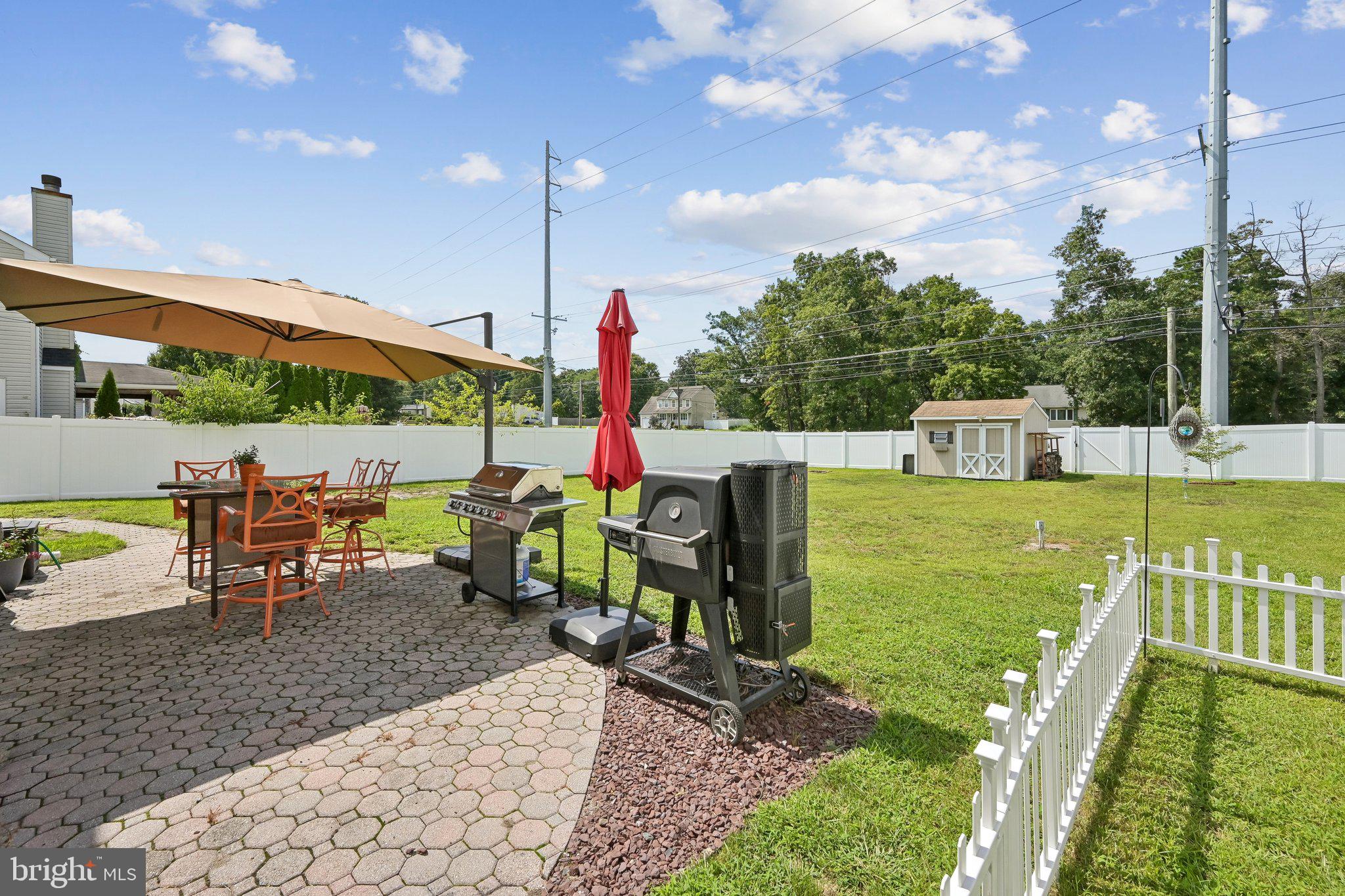 14 Chestertown Road Sicklerville, NJ 08081 - Photo 28 of 29 Sunny backyard oasis with grill and shade.