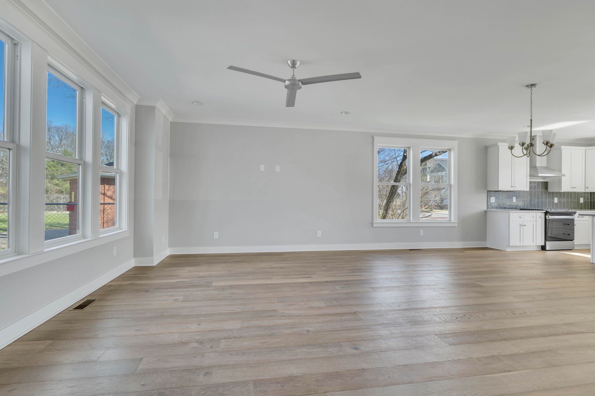 142 Strahl Street Franklin, TN 37064 - Photo 21 of 51 a view of empty room with wooden floor and fan
