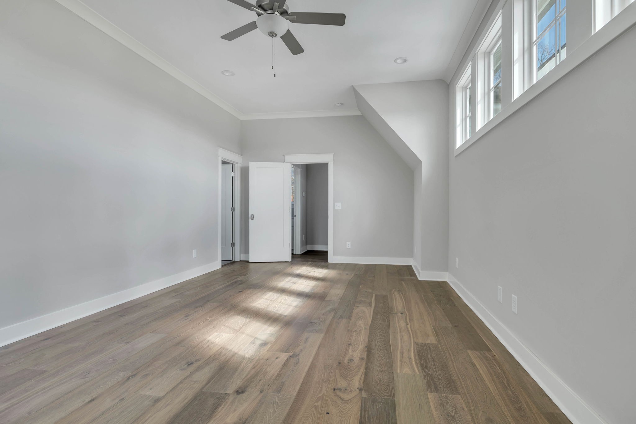 142 Strahl Street Franklin, TN 37064 - Photo 24 of 51 a view of an empty room with a chandelier fan